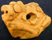 吉作遺跡　イノシシの横顔の装飾土器片